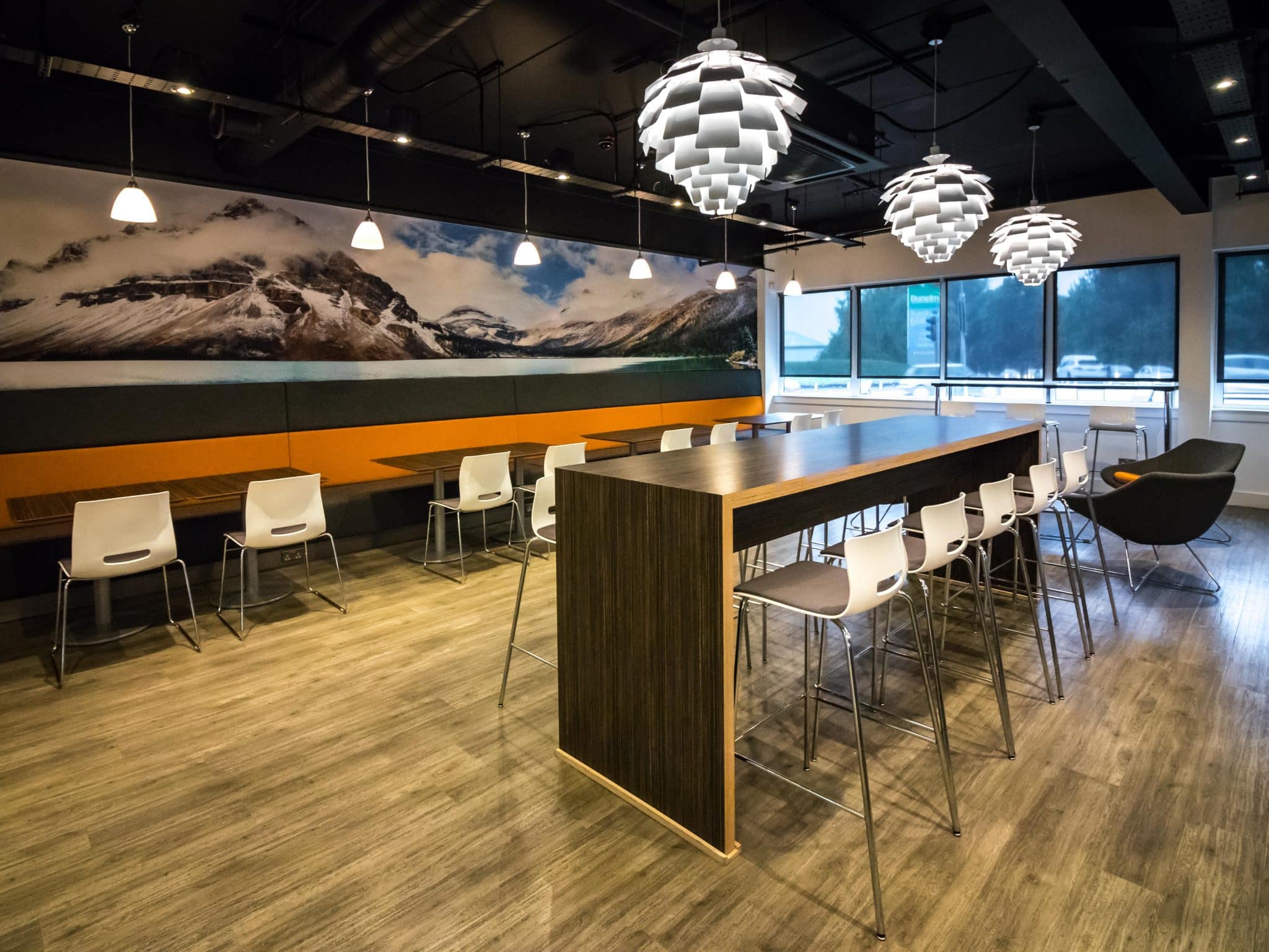 Canteen bar with pendant lights at South West Communications, Exeter